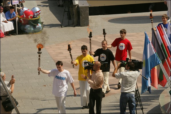 Russian students, carrying the symbolic olympic fire